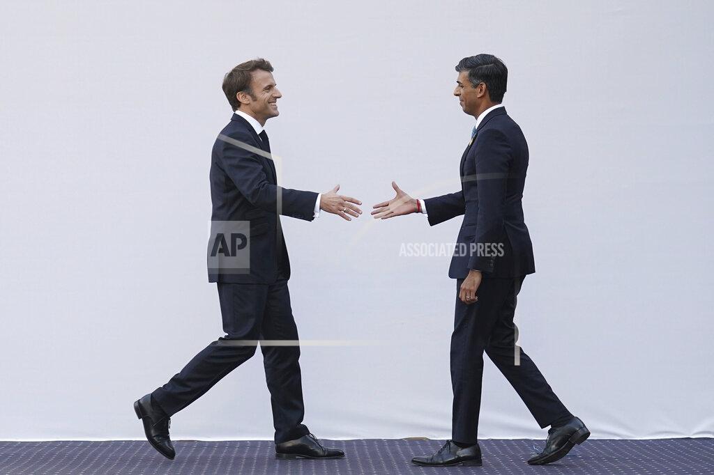 Stefan Rousseau FILE - Britain's Prime Minister Rishi Sunak right, reaches to shake hands with President of France Emmanuel Macron ahead of a bilateral meeting during the COP27 summit, in Sharm el-Sheikh, Egypt, Nov. 7, 2022. In his first month as Britain's prime minister, Rishi Sunak has stabilized the economy, reassured allies from Washington to Kyiv and even soothed the European Union after years of sparring between Britain and the bloc. But Sunak’s challenges are just beginning. He is facing a stagnating economy, a cost-of-living crisis – and a Conservative Party that is fractious and increasingly unpopular after 12 years in power. (Stefan Rousseau/Pool Photo via AP, File)