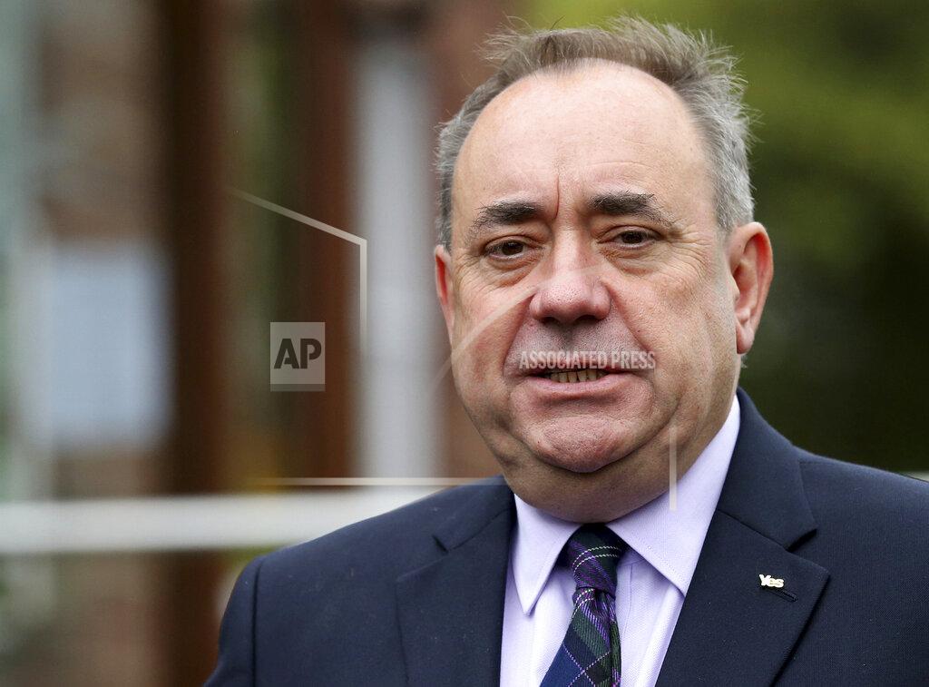 Scott Heppell FILE - In this Thursday, Sept. 18, 2014 file photo, Scotland's former First Minister Alex Salmond poses for photographs in Turriff, Scotland. Former allies Scotland's politicians Alex Salmond and Nicola Sturgeon have been trading accusations in a feud that seems to be tearing apart their Scottish National Party, as Salmond is scheduled to appear at a Scottish Parliament inquiry Wednesday Feb. 24, 2021. (AP Photo/Scott Heppell, file)