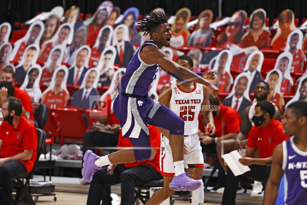 Brad Tollefson Kansas State's Nijel Pack (24) reacts after a three-point play during the first half of an NCAA college basketball game against Texas Tech, Tuesday, Jan. 5, 2021, in Lubbock, Texas. (AP Photo/Brad Tollefson)