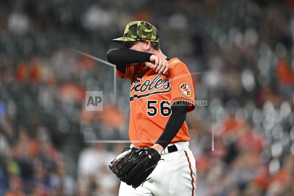 Gail Burton Baltimore Orioles pitcher Kyle Bradish walks to the dugout after leaving the baseball game against the Tampa Bay Rays during the sixth inning Saturday, May 21, 2022, in Baltimore. (AP Photo/Gail Burton)