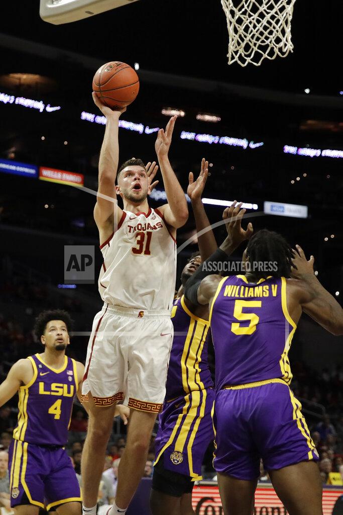 Marcio Jose Sanchez Southern California forward Nick Rakocevic (31) scores against LSU during the first half of an NCAA college basketball game Saturday, Dec. 21, 2019, in Los Angeles. (AP Photo/Marcio Jose Sanchez)