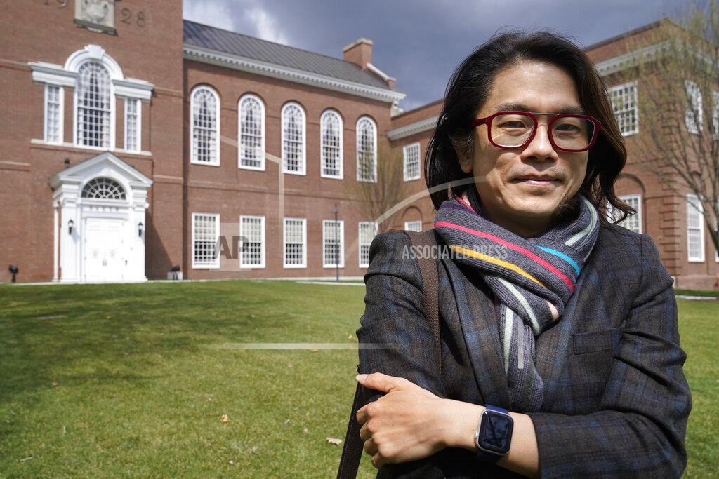 Steven Senne Eng-Beng Lim, a professor at Dartmouth College, stands for a photograph on the school's campus, Tuesday, April 20, 2021, in Hanover, N.H. A wave of anti-Asian attacks that started more than a year ago with the pandemic, along with the March 2021 shootings in Atlanta that left six Asian women dead, have provoked national conversations about the visibility of Asian Americans. (AP Photo/Steven Senne)