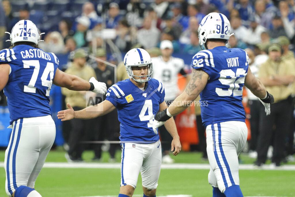 Aj Mast Indianapolis Colts kicker Adam Vinatieri (4) is congratulated by Anthony Castonzo (74) and Margus Hunt (92) after Vinatieri kicked a 34-yard field during the first half of an NFL football game against the Jacksonville Jaguars, Sunday, Nov. 17, 2019, in Indianapolis. (AP Photo/AJ Mast)