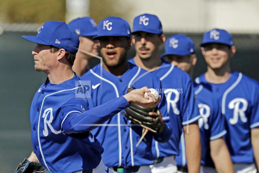 Charlie Riedel Kansas City Royals pitcher Tim Hill throws during spring training baseball practice Monday, Feb. 17, 2020, in Surprise, Ariz. (AP Photo/Charlie Riedel)