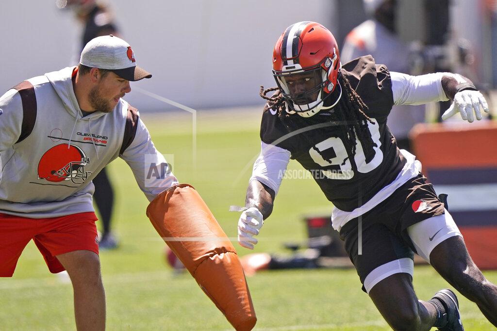 Tony Dejak Cleveland Browns linebacker Jadeveon Clowney (90) runs a drill during an NFL football practice, Monday, Aug. 2, 2021, in Berea, Ohio. (AP Photo/Tony Dejak)