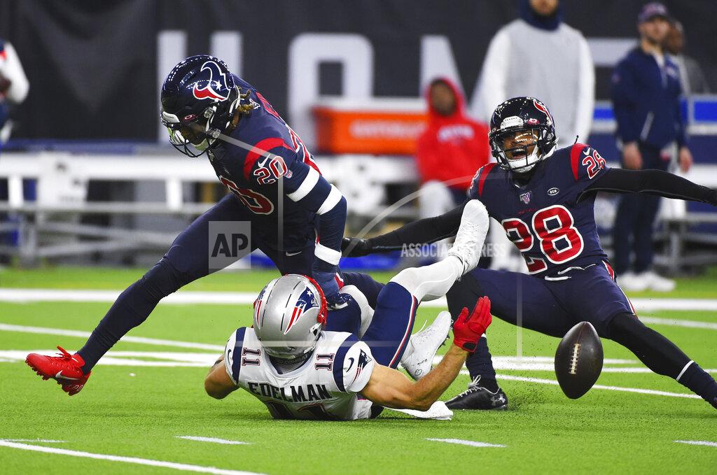 Eric Christian Smith Houston Texans strong safety Justin Reid (20) and cornerback Vernon III Hargreaves (28) break up a pass intended for New England Patriots wide receiver Julian Edelman (11) during the first half of an NFL football game Sunday, Dec. 1, 2019, in Houston. (AP Photo/Eric Christian Smith)