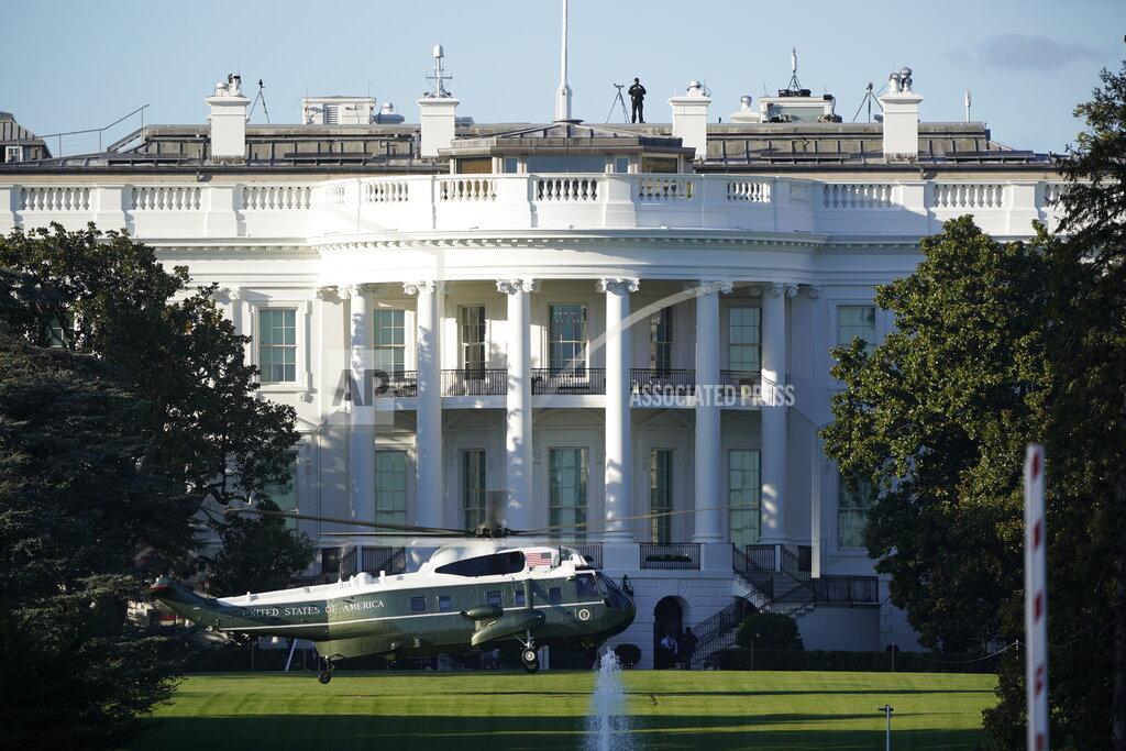 J. Scott Applewhite The helicopter that will carry President Donald Trump to Walter Reed National Military Medical Center in Bethesda, Md., lands on the South Lawn of White House in Washington, Friday, Oct. 2, 2020. The White House says Trump will spend a "few days" at the military hospital after contracting COVID-19. (AP Photo/J. Scott Applewhite)