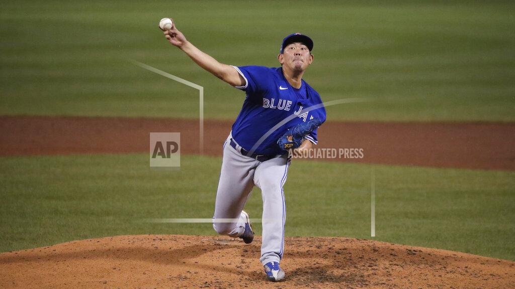 Toronto Blue Jays pitcher Shun Yamaguchi delivers during the fourth inning of an exhibition baseball game against the Boston Red Sox, Wednesday, July 22, 2020, at Fenway Park in Boston. (AP Photo/Charles Krupa)