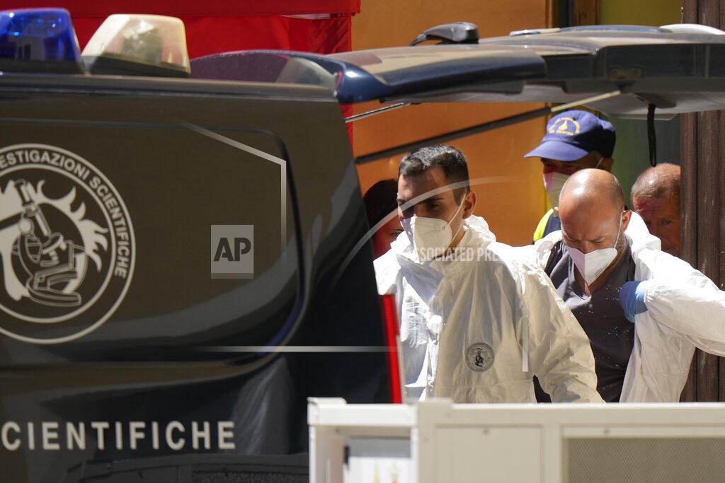 Luca Bruno Italian Carabinieri police officers arrive at Canazei, in the Italian Alps in northern Italy, Wednesday, July 6, 2022, to investigate over an avalanche that broke loose on Sunday from the Punta Rocca glacier sending tons of ice, snow, and rocks onto hikers. (AP Photo/Luca Bruno)