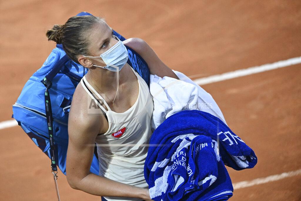 Czech Republic's Karolina Pliskova leaves after winning her match with Marketa Vondrousova during their semifinal at the Italian Open tennis tournament, in Rome, Sunday, Sept. 20, 2020. (Alfredo Falcone/LaPresse via AP)