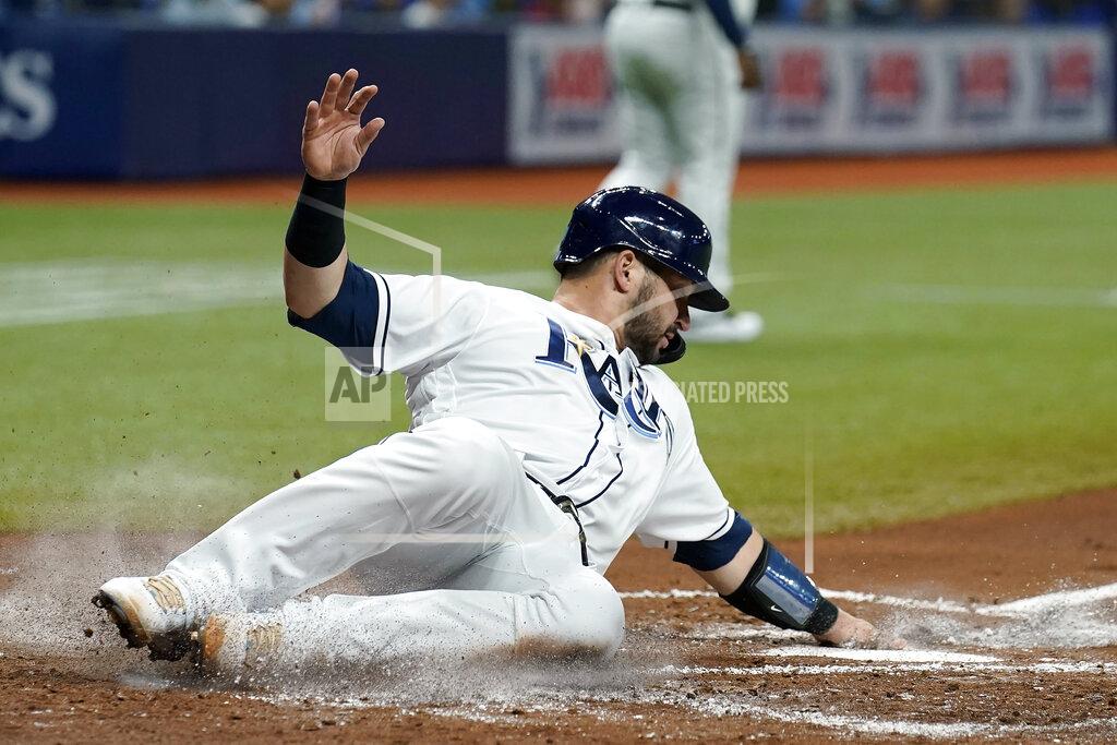 Chris O'MEara Tampa Bay Rays' Mike Zunino scores on an RBI single by Brandon Lowe off Toronto Blue Jays starting pitcher Alek Manoah during the second inning of a baseball game Tuesday, Sept. 21, 2021, in St. Petersburg, Fla. (AP Photo/Chris O'Meara)