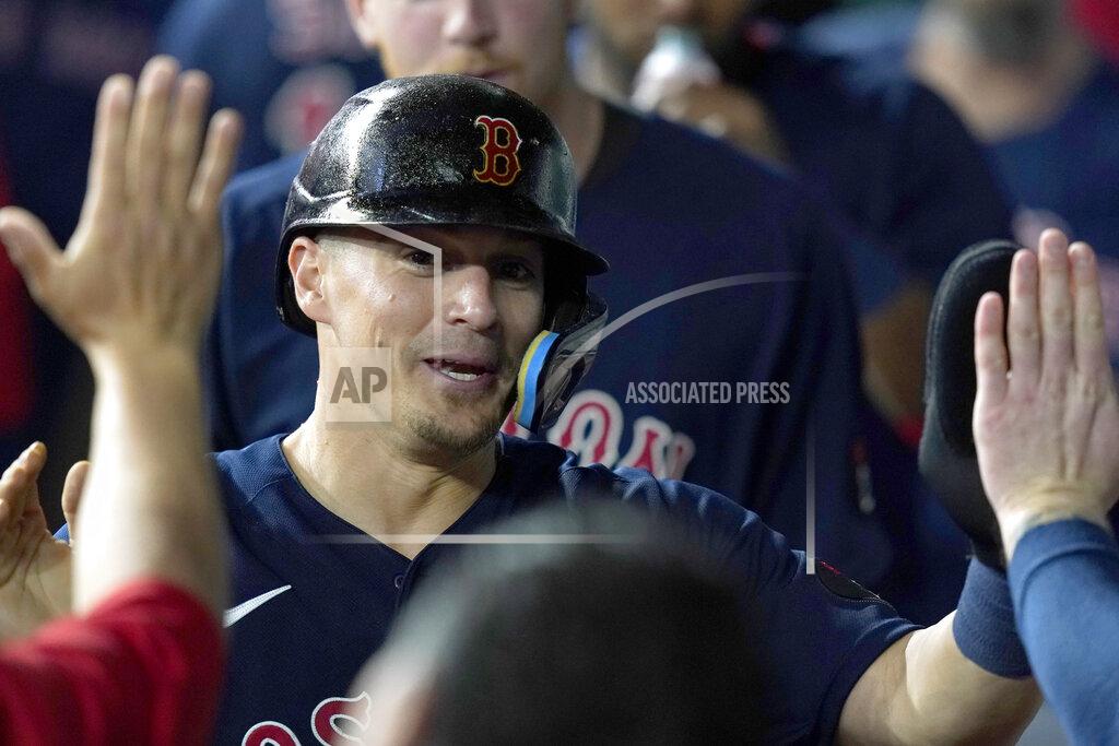 Lm Otero Boston Red Sox's Enrique Hernandez is congratulated by teammates after scoring from second base on a single by Rafael Devers during the third inning of the team's baseball game against the Texas Rangers in Arlington, Texas, Friday, May 13, 2022. (AP Photo/LM Otero)