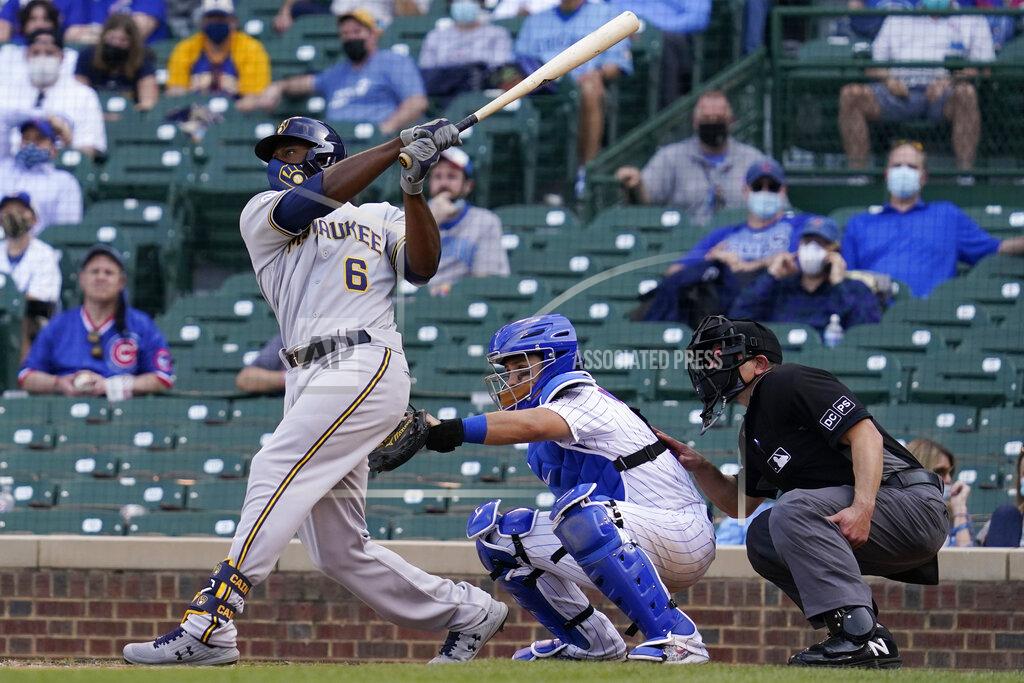 Nam Y. Huh Milwaukee Brewers' Lorenzo Cain hits a three-run home run against the Chicago Cubs during the 10th inning of a baseball game in Chicago, Wednesday, April 7, 2021. (AP Photo/Nam Y. Huh)