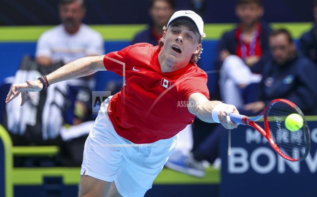 Hamish Blair Canada's Denis Shapovalov makes a forehand return to Serbia's Novak Djokovic during their ATP Cup match in Melbourne, Australia, Tuesday, Feb. 2, 2021. (AP Photo/Hamish Blair)