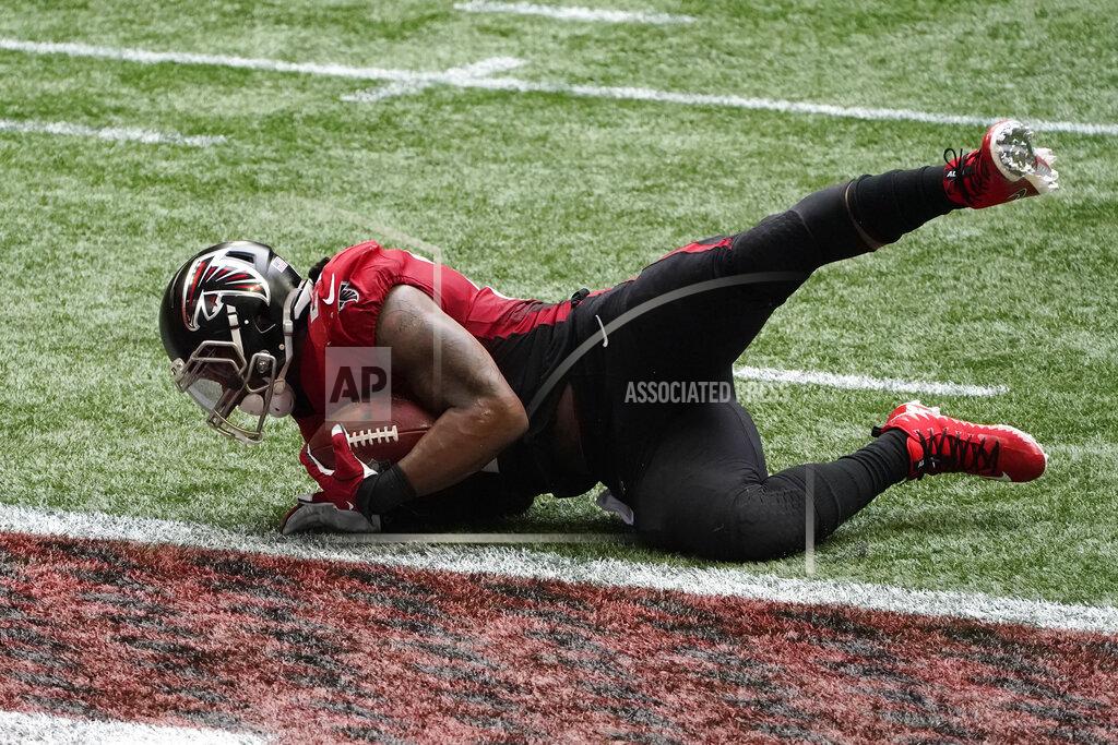 John Bazemore Atlanta Falcons running back Todd Gurley (21) scores a touchdown against the Detroit Lions during the second half of an NFL football game, Sunday, Oct. 25, 2020, in Atlanta. (AP Photo/John Bazemore)