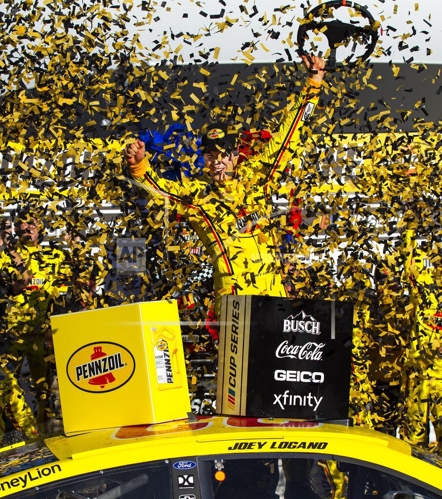 Chase Stevens Joey Logano celebrates after winning a NASCAR Cup Series auto race at Las Vegas Motor Speedway on Sunday, Feb. 23, 2020. (AP Photo/Chase Stevens)
