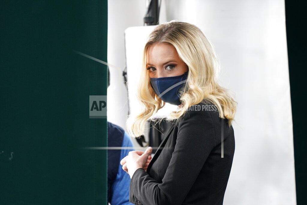 White House press secretary Kayleigh McEnany, walks up to be interviewed by Fox News, Sunday, Oct. 4, 2020, at the White House in Washington. (AP Photo/Jacquelyn Martin)