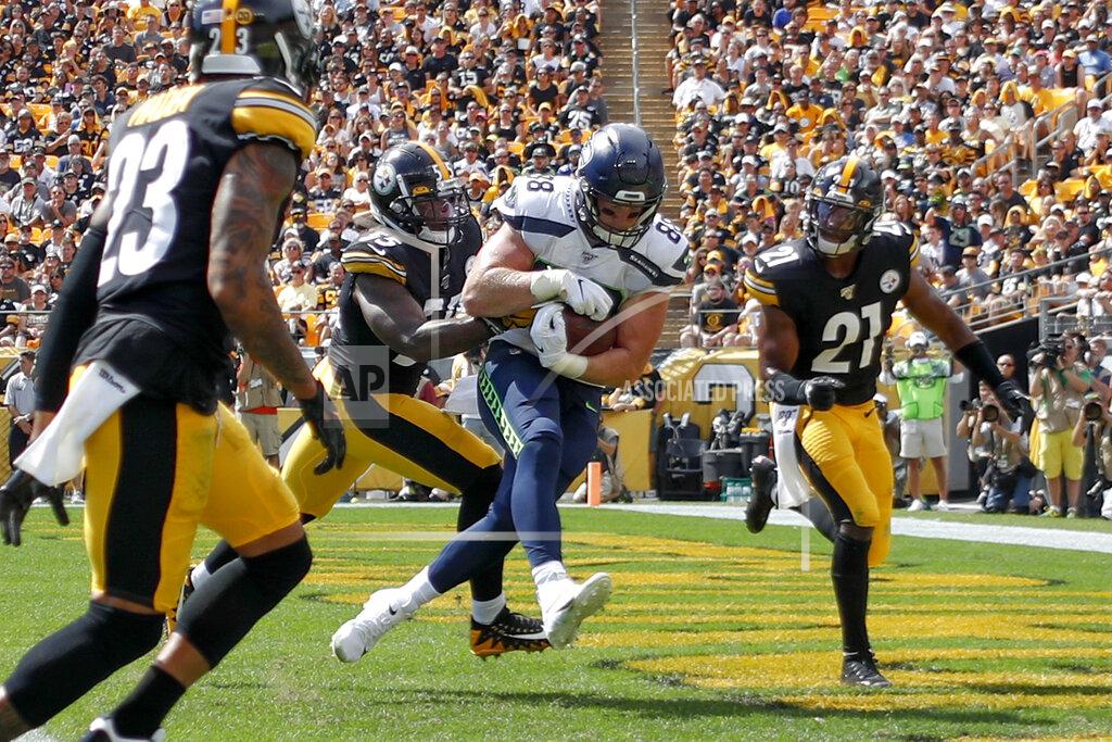 Don Wright Seattle Seahawks tight end Will Dissly (88) makes a touchdown catch past Pittsburgh Steelers linebacker Devin Bush (55) and other defenders in the first half of an NFL football game, Sunday, Sept. 15, 2019, in Pittsburgh. (AP Photo/Don Wright)
