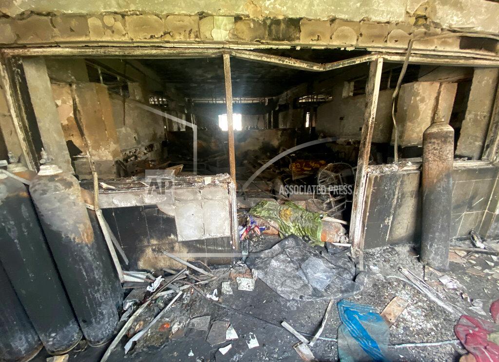Khalid Mohammed Charred oxygen cylinders are seen in the intensive care unit of the Ibn al-Khatib hospital following a fire that broke out of last Saturday evening killing over 80 people and injuring over 100, in Baghdad, Iraq, Tuesday, April 27, 2021. Medical staff who witnessed the first moments of the fire described horrific scenes: deafening screams, a patient who jumped to his death to escape the inferno and relatives who died because they refused to abandon coronavirus patients tethered to ventilators. (AP Photo/Khalid Mohammed)