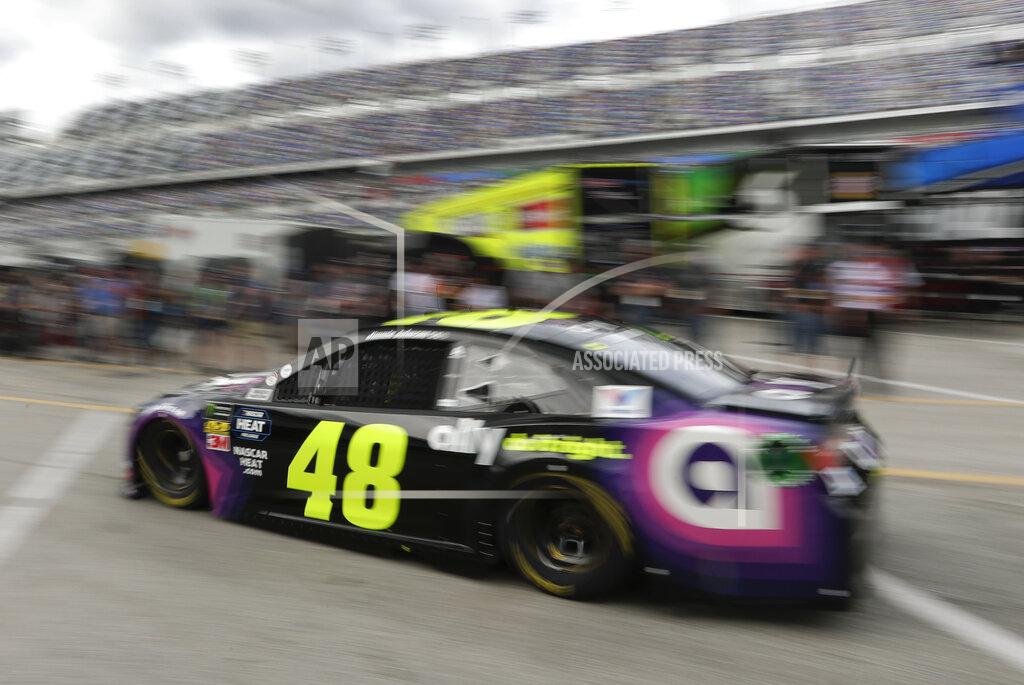 John Raoux Jimmie Johnson (48) drives out of the garages to the track during NASCAR auto racing practice at Daytona International Speedway, Saturday, Feb. 16, 2019, in Daytona Beach, Fla. (AP Photo/John Raoux)