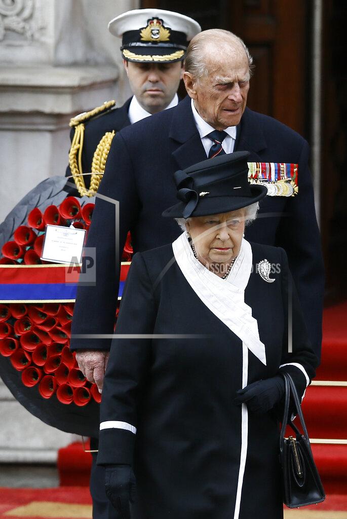Kirsty Wigglesworth FILE - In this file photo dated Saturday, April 25, 2015, Britain's Queen Elizabeth II and Prince Philip, arrive to attend a ceremony at the Cenotaph to commemorate ANZAC Day and the Centenary of the Gallipoli Campaign in Whitehall, London. The ANZAC Day memorial Saturday marks the 100th anniversary of the 1915 Gallipoli landings, the first major military action fought by the Australian and New Zealand Army Corps during World War I. Prince Philip who died Friday April 9, 2021, aged 99, lived through a tumultuous century of war and upheavals, but he helped forge a period of stability for the British monarchy under his wife, Queen Elizabeth II. (AP Photo/Kirsty Wigglesworth, FILE)