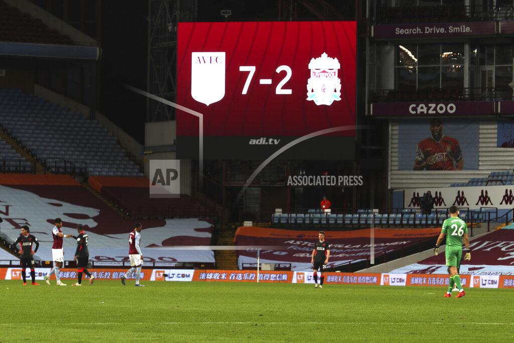 Cath Ivill Liverpool players in dejection end of the English Premier League soccer match between Aston Villa and Liverpool at the Villa Park stadium in Birmingham, England, Sunday, Oct. 4, 2020. Aston Villa won 7-2. (Cath Ivill/Pool via AP)