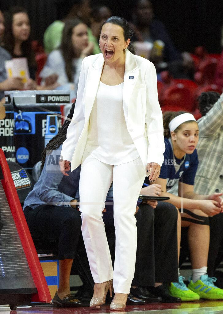 Ben Mckeown Longwood head coach Rebecca Tillett shouts at an official during the first half of a college basketball game against North Carolina State in the first round of the NCAA tournament in Raleigh, N.C., Saturday, March 19, 2022. (AP Photo/Ben McKeown)