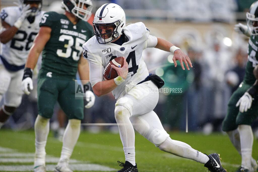 Al Goldis Penn State quarterback Sean Clifford, center, scores on a two-point conversion against Michigan State during the second quarter of an NCAA college football game, Saturday, Oct. 26, 2019, in East Lansing, Mich. (AP Photo/Al Goldis)