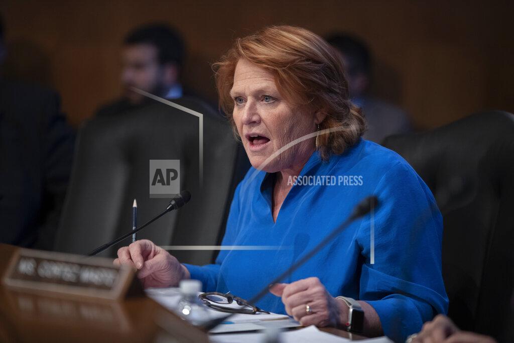 J. Scott Applewhite FILE - In this Dec. 12, 2018, file photo, Sen. Heidi Heitkamp, D-N.D., attends her last hearing with the Senate Committee on Indian Affairs as they examine concerns about investigations into the deaths and disappearance of Native American women, on Capitol Hill in Washington. Two Democratic women are contenders to be President-elect Joe Biden's secretary of agriculture. Rep. Marcia Fudge of Ohio and former Sen. Heidi Heitkamp of North Dakota are in the running for the Cabinet position. (AP Photo/J. Scott Applewhite, File)