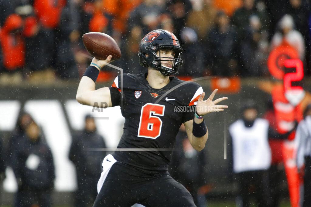 Timothy J. Gonzalez FILE - In this Nov. 23, 2018, file photo, Oregon State quarterback Jake Luton passes during an NCAA college football game in Corvallis, Ore. Jake Luton is determined to make the most of his last chance. After a career marred by injury, he was granted a sixth season of eligibility. (AP Photo/Timothy J. Gonzalez, File)
