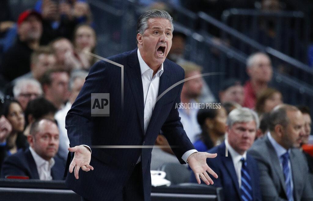 John Locher Kentucky's head coach John Calipari reacts after a play against Ohio State during the first half of an NCAA college basketball game Saturday, Dec. 21, 2019, in Las Vegas. (AP Photo/John Locher)