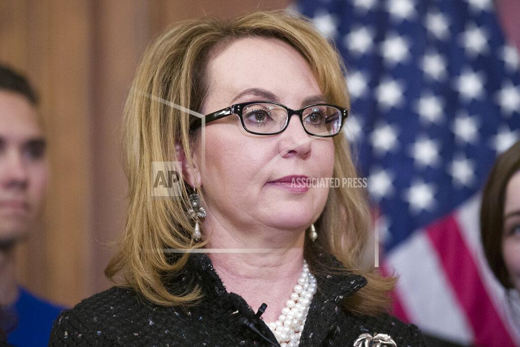 Alex Brandon FILE - Former Rep. Gabby Giffords, stands during a news conference to announce the introduction of bipartisan legislation to expand background checks for sales and transfers of firearms, on Capitol Hill, Jan. 8, 2019 in Washington. President Joe Biden will present the nation’s highest civilian honor, the Presidential Medal of Freedom, to 17 people, at the White House next week. (AP Photo/Alex Brandon, File)
