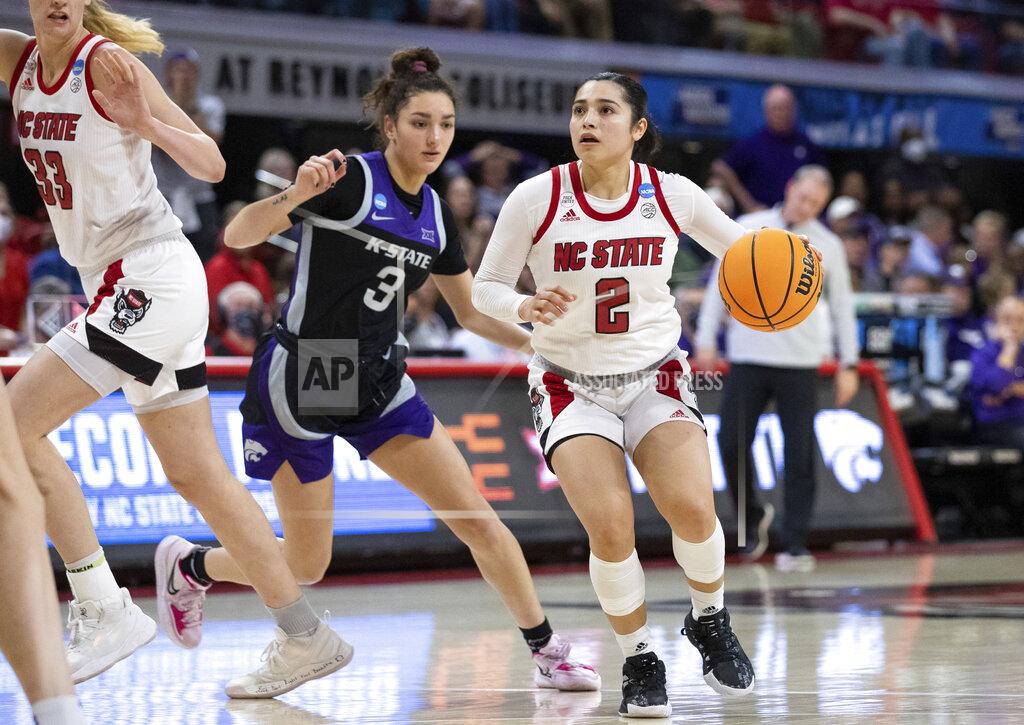 Ben Mckeown North Carolina State's Raina Perez (2) handles the ball ahead of Kansas State's Jaelyn Glenn (3) during the second half of a college basketball game in the second round of the NCAA tournament in Raleigh, N.C., Monday, March 21, 2022. (AP Photo/Ben McKeown)