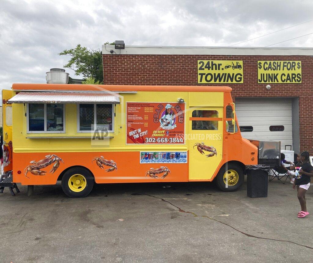 José Ignacio Castañeda The Crab Cravers food truck is pictured at its grand opening event in Wilmington, Del., on Sunday, July 18, 2021. (José Ignacio Castañeda /The News Journal via AP)