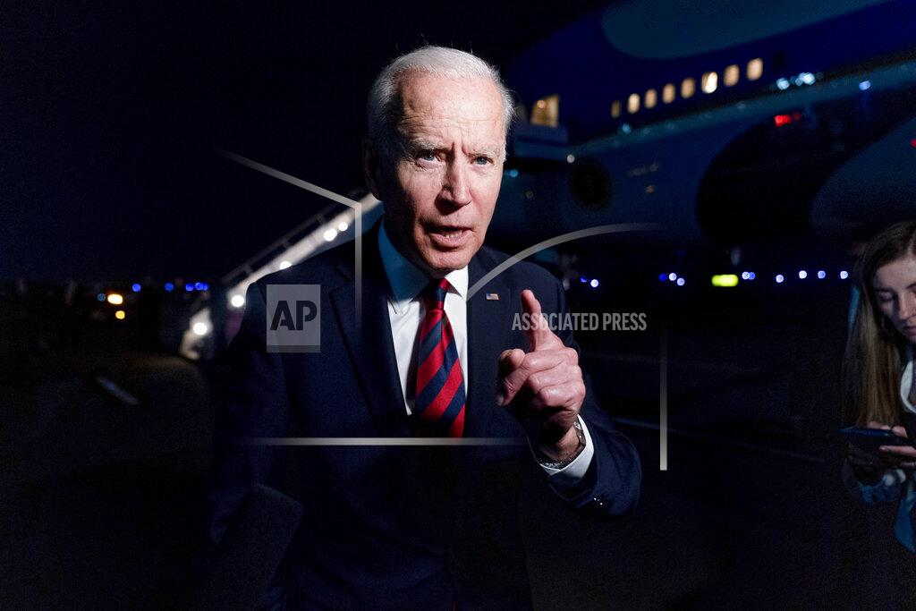 Andrew Harnik President Joe Biden talks to reporters before he boards Air Force One at Cincinnati/Northern Kentucky International Airport in Hebron, Ky., Wednesday, July 21, 2021, to travel back to Washington after speaking at a CNN town hall in Cincinnati. (AP Photo/Andrew Harnik)