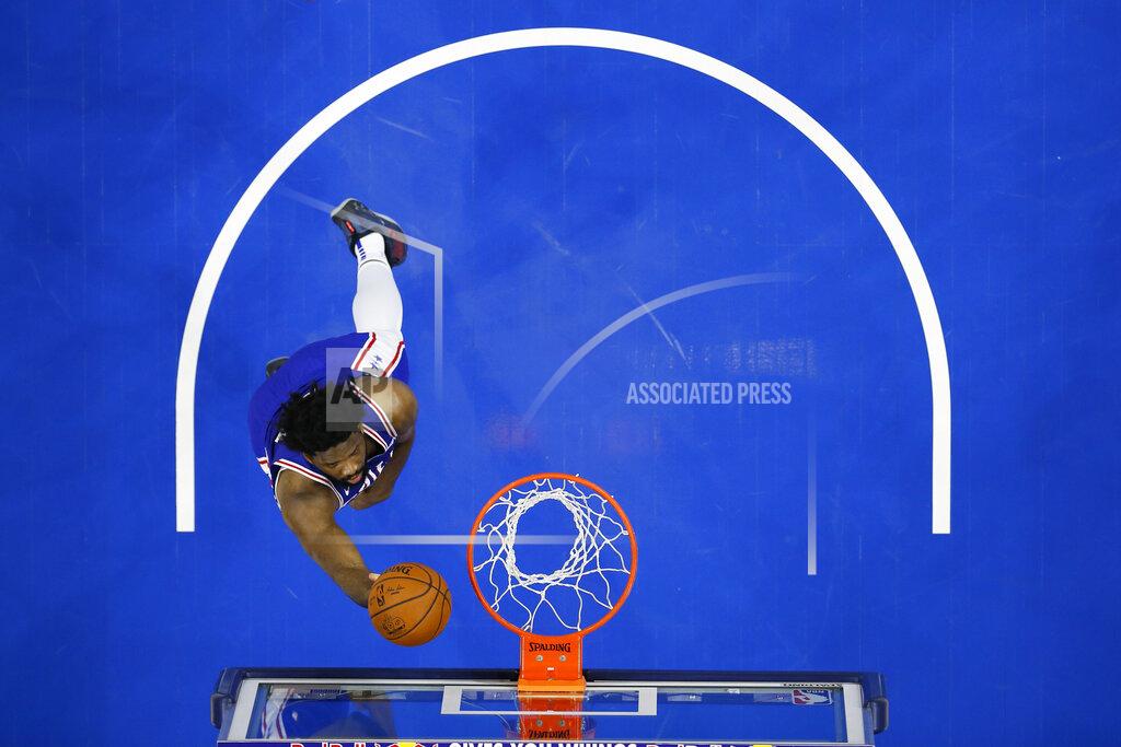 Matt Slocum Philadelphia 76ers' Joel Embiid goes up for a shot during the first half of an NBA basketball game against the Charlotte Hornets, Monday, Jan. 4, 2021, in Philadelphia. (AP Photo/Matt Slocum)