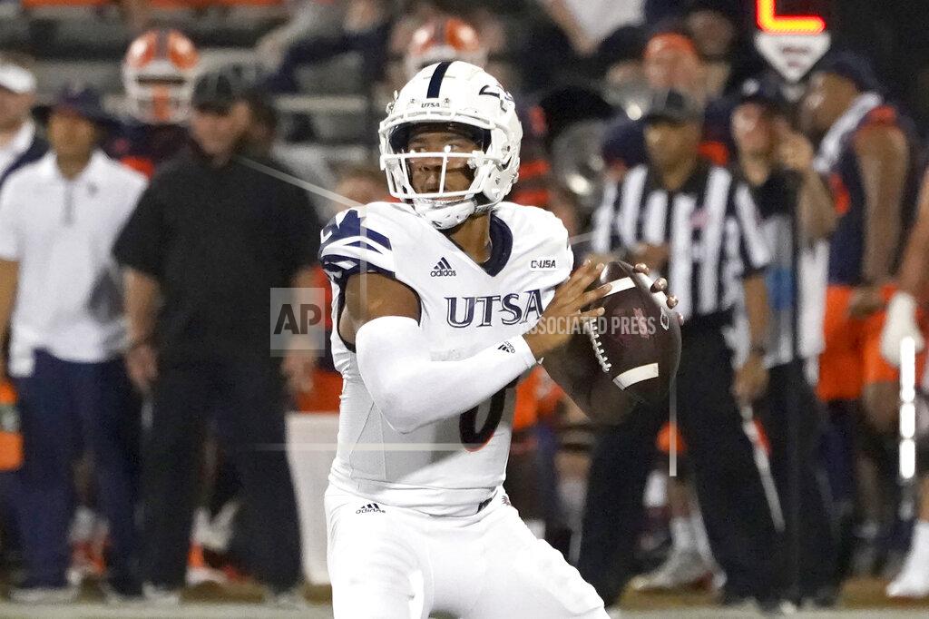 Charles Rex Arbogast UTSA quarterback Frank Harris looks to pass during the first half of an NCAA college football game against Illinois, Saturday, Sept. 4, 2021, in Champaign, Ill. (AP Photo/Charles Rex Arbogast)