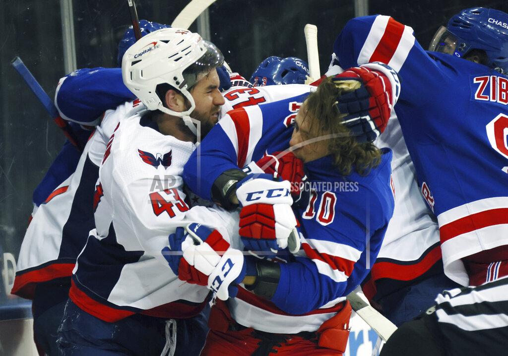 Bruce Bennett Washington Capitals' Tom Wilson (43) takes a roughing penalty during the second period against New York Rangers' Artemi Panarin (10) in an NHL hockey game Monday, May 3, 2021, in New York. (Bruce Bennett/Pool Photo via AP)