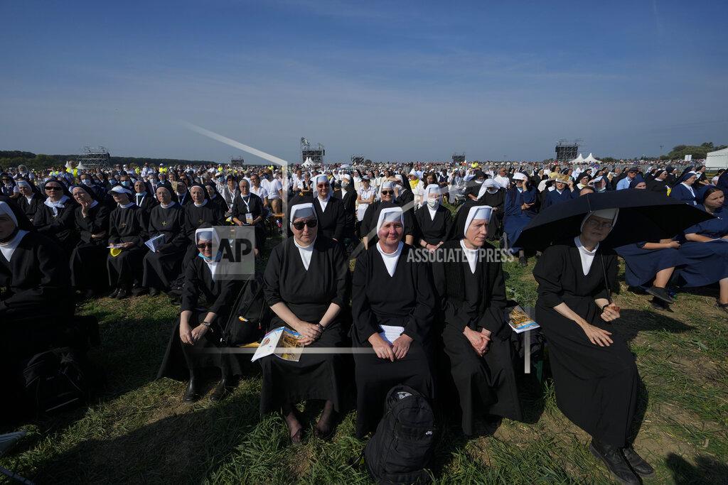 Petr David Josek Nuns attend a Mass celebrated by Pope Francis in the esplanade of the National Shrine in Sastin, Slovakia, Wednesday, Sept. 15, 2021. Pope Francis celebrated an open air Mass in Sastin, the site of an annual pilgrimage each September 15 to venerate Slovakia's patron, Our Lady of Sorrows. (AP Photo/Petr David Josek)