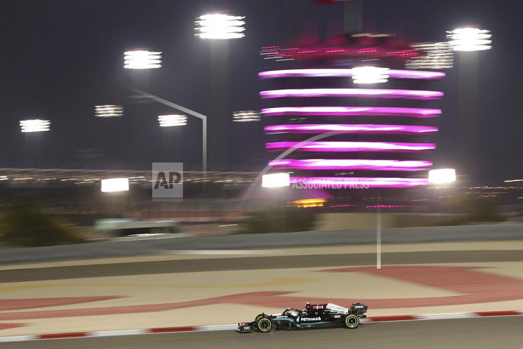 Kamran Jebreili Mercedes driver Valtteri Bottas of Finland steers his car during the second free practice at the Formula One Bahrain International Circuit in Sakhir, Bahrain, Friday, March 26, 2021. The Bahrain Formula One Grand Prix will take place on Sunday. (AP Photo/Kamran Jebreili)