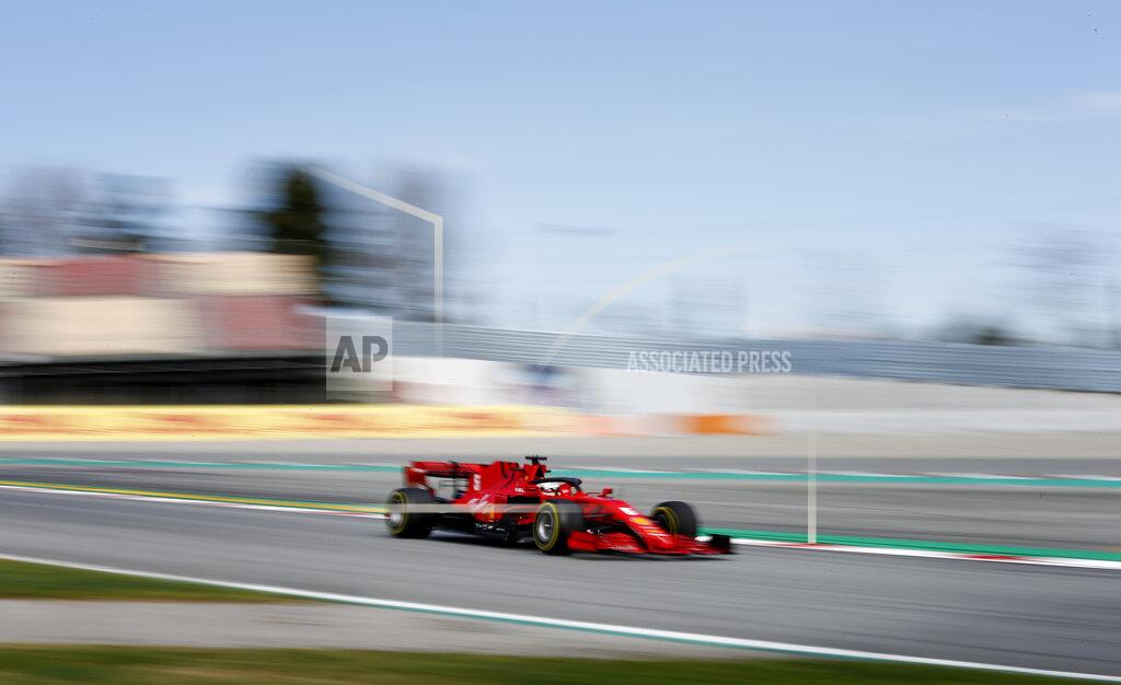 Joan Monfort Ferrari driver Sebastian Vettel of Germany steers his car during the Formula One pre-season testing session at the Barcelona Catalunya racetrack in Montmelo, outside Barcelona, Spain, Thursday, Feb. 27, 2020. (AP Photo/Joan Monfort)