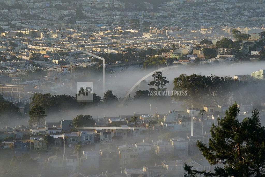 Jeff Chiu FILE - In this Oct. 20, 2020, file photo low-lying morning fog is shown over San Francisco. Rising inflation is expected to lead to a sizeable increase in Social Security's annual cost-of-living adjustment, or COLA, for 2022. Exactly how much will be revealed Wednesday morning after a Labor Department report on inflation during September, a data point used in the final calculation. (AP Photo/Jeff Chiu, File)