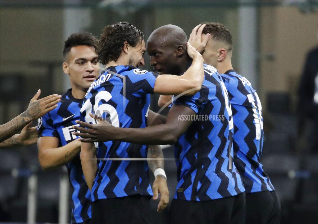 Luca Bruno Inter Milan's Romelu Lukaku, second from right, celebrates with his teammates after scoring his side's opening goal during the Champions League group B soccer match between Inter Milan and Borussia Moenchangladbach at the San Siro stadium in Milan, Italy, Wednesday, Oct. 21, 2020. (AP Photo/Luca Bruno)