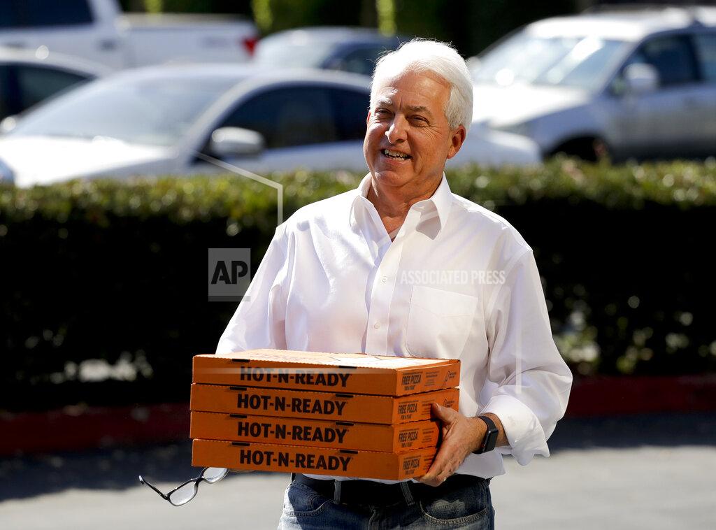 Chris Carlson FILE - In this Nov. 6, 2018, file photo, Republican gubernatorial candidate John Cox brings lunch to the offices of Rep. Mimi Walters, R-Calif., in Irvine, Calif. Cox and Caitlyn Jenner, two Republicans running to oust California Gov. Gavin Newsom, sought to make a fresh impression with voters Tuesday, May 4, 2021, with the release of new campaign ads, marking a new phase in the pending recall. (AP Photo/Chris Carlson, File)