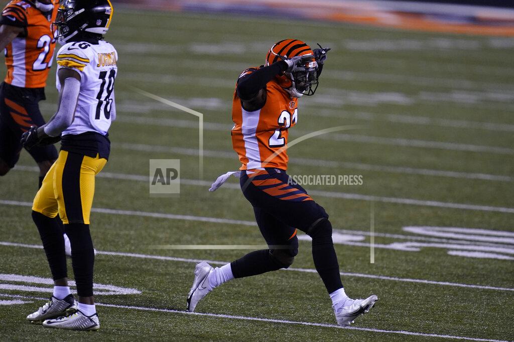Michael Conroy Cincinnati Bengals' Mackensie Alexander (21) reacts to breaking up a pass during the first half of an NFL football game against the Pittsburgh Steelers, Monday, Dec. 21, 2020, in Cincinnati. (AP Photo/Michael Conroy)