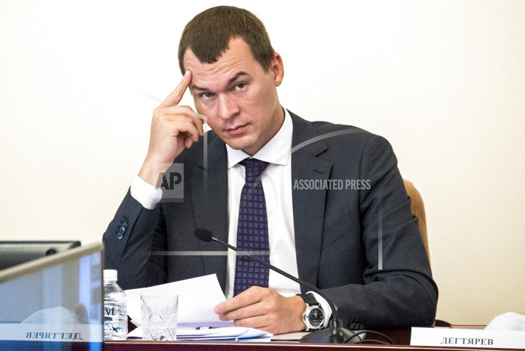 Igor Volkov FILE - In this July 30, 2020, file photo, acting governor Mikhail Degtyaryov, a former federal lawmaker from the Liberal Democratic Party, leads a meeting of local officials in the Russian city of Khabarovsk, in the country's Far East. Degtyaryov is on the ballot for governor in the three days of regional voting that concludes Sunday, Sept. 19, 2021. (AP Photo/Igor Volkov, File)
