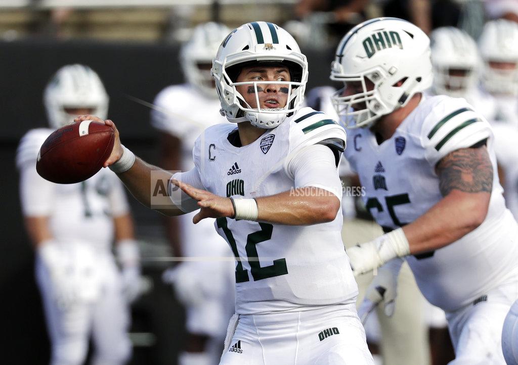 Mark Humphrey FILE - In this Saturday, Sept. 15, 2018 file photo, Ohio quarterback Nathan Rourke (12) passes against Virginia in the first half of an NCAA college football game in Nashville, Tenn. Ohio goes for its third win in a row, and sixth in seven games when the Bobcats play San Diego State in the Frisco Bowl in suburban Dallas, on Wednesday, Dec. 19, 2018.(AP Photo/Mark Humphrey, File)