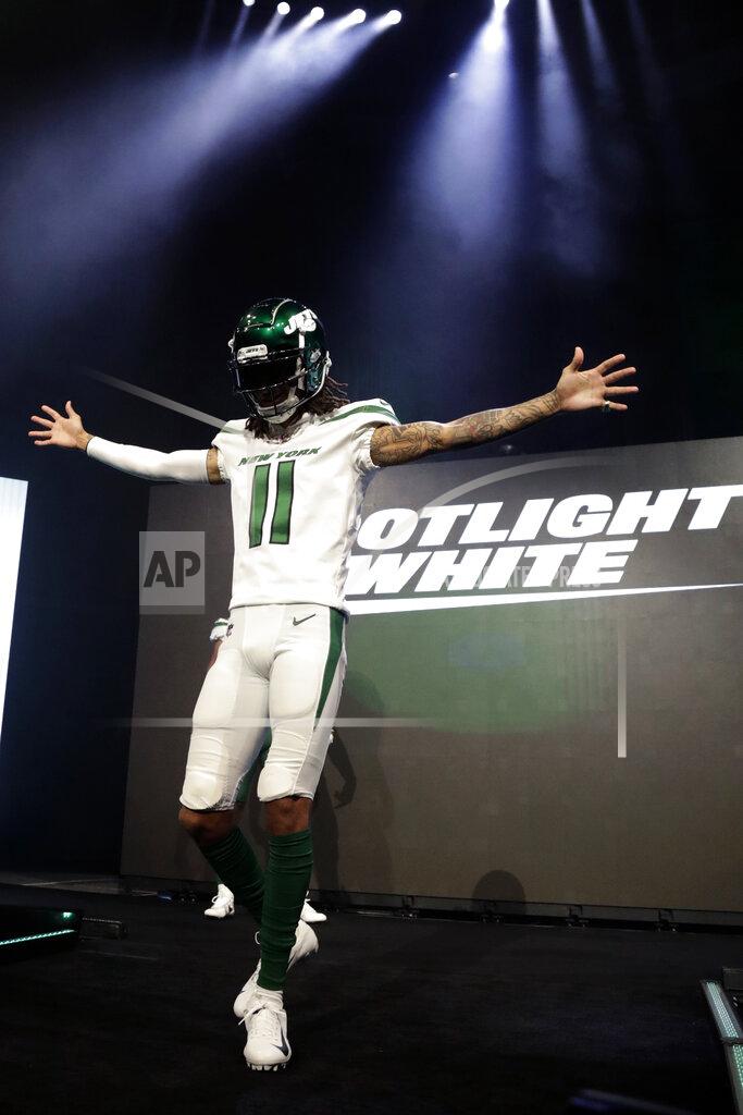 Julio Cortez New York Jets wide receiver Robby Anderson models the NFL football team's new "spotlight white" uniform Thursday, April 4, 2019, in New York. (AP Photo/Julio Cortez)