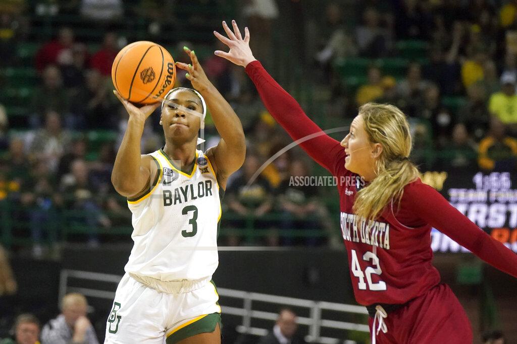 Lm Otero Baylor guard Jordan Lewis (3) shoots against South Dakota guard Maddie Krull (42) during the first half of a college basketball game in the second round of the NCAA tournament in Waco, Texas, Sunday, March 20, 2022. (AP Photo/LM Otero)