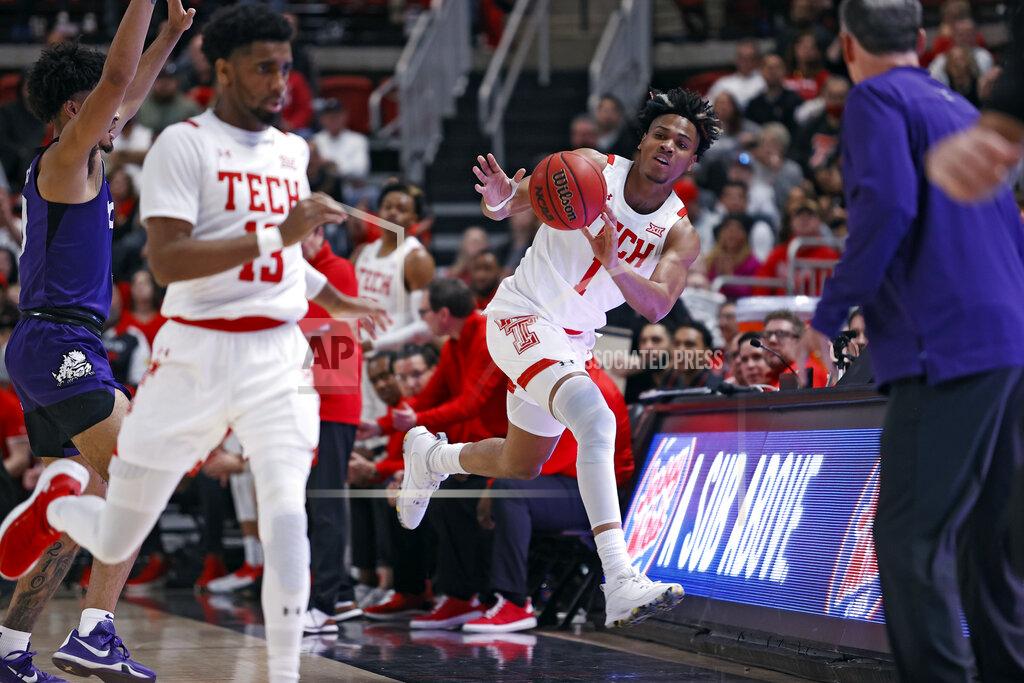 Brad Tollefson Texas Tech's Terrence Shannon Jr. (1) throws the ball before running out of bounds during the first half of an NCAA college basketball game against TCU, Saturday, Feb. 12, 2022, in Lubbock, Texas. (AP Photo/Brad Tollefson)